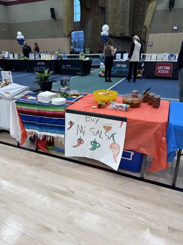 Mi Salsa table at a local community event